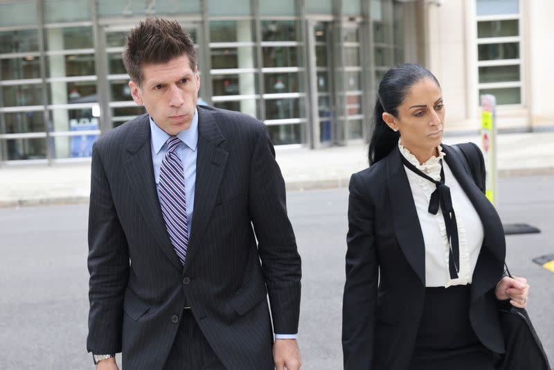 Defense attorneys for R. Kelly, Thomas Farinella and Nicole Blank Becker, leave Brooklyn federal court as singer R. Kelly's sex abuse trial continues in Brooklyn, New York