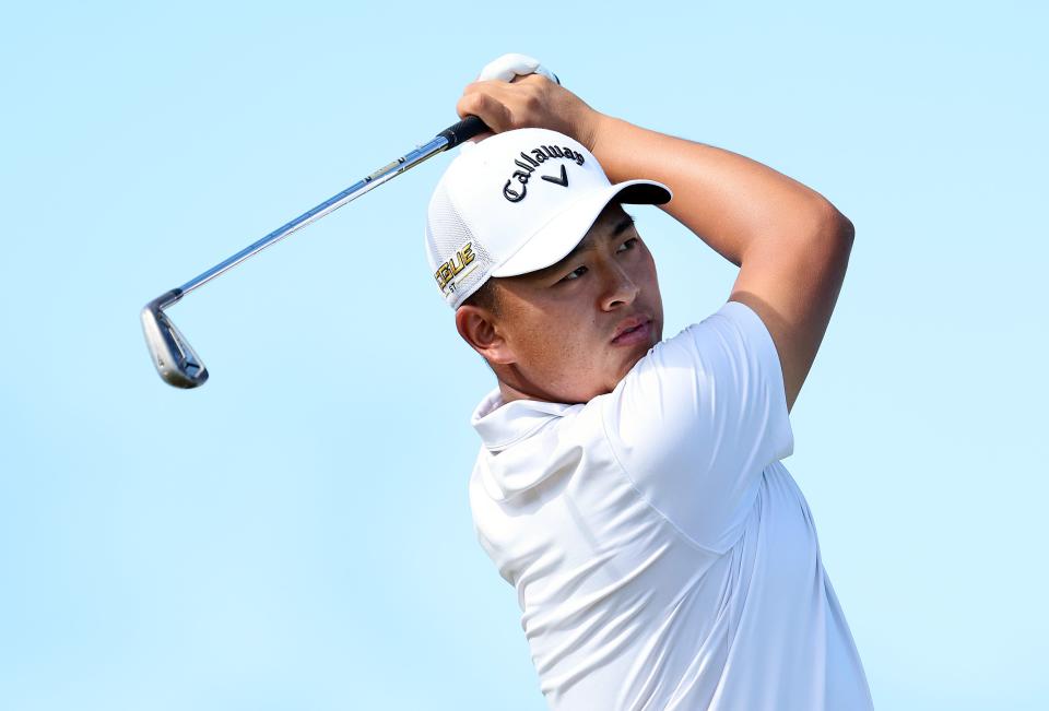 Kevin Yu watches his tee shot on the first hole during the final round of the 2022 Butterfield Bermuda Championship at Port Royal Golf Course in Southampton, Bermuda. Photo by Andy Lyons/Getty Images