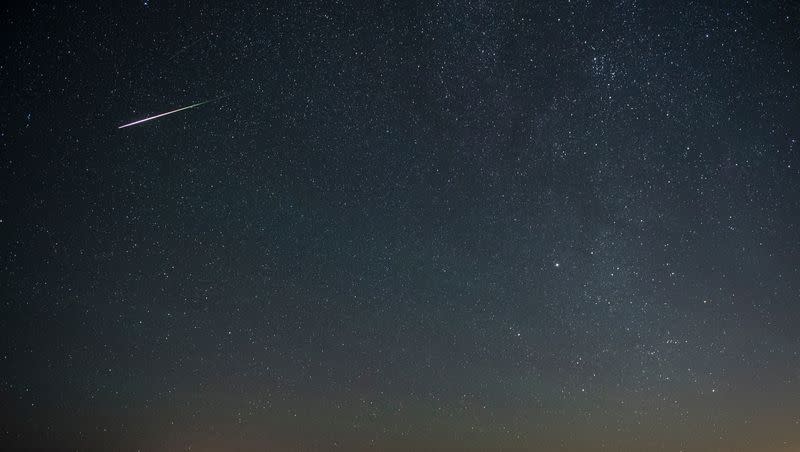 A meteor streaks through the sky near the Grassy Mountains in Tooele County during the Perseid meteor shower on Friday, Aug. 12, 2016. The Perseids will reach its peak on the nights of Aug. 12-13, 2023.