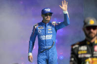 Kyle Larson is introduced to the fans before a NASCAR Cup Series auto race on Sunday, Nov. 7, 2021, in Avondale, Ariz. (AP Photo/Rick Scuteri)