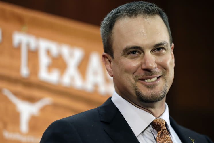 Texas introduces new coach Tom Herman at a Saturday press conference. (AP)