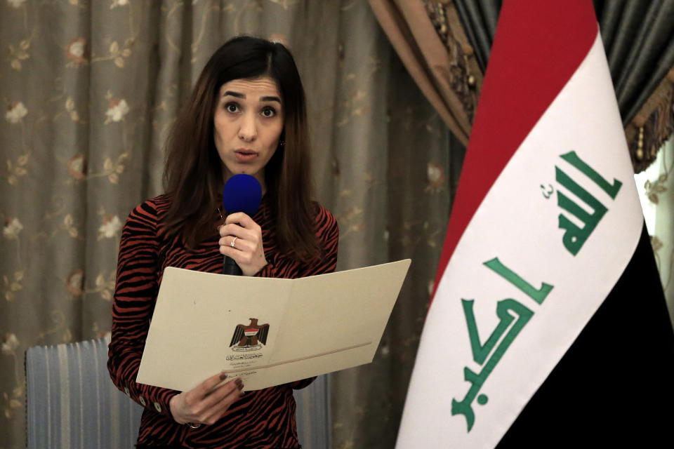 FILE - In this Dec. 12, 2018, file photo, Nobel Peace Prize recipient Nadia Murad speaks during a meeting with Iraqi President Barham Salih and other dignitaries, in Baghdad, Iraq. Murad, a Yazidi woman who was among those kidnapped and enslaved, welcomed the news of the death of Islamic State leader Abu Bakr al-Baghdadi. (AP Photo/Karim Kadim, File)