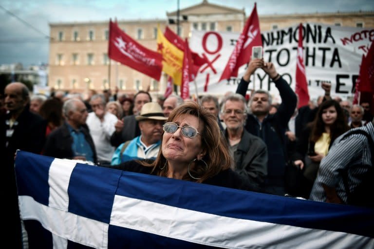 Demonstrators took to the streets as Greek lawmakers fulfilled the eurozone's latest demands for painful reforms in a vote last week
