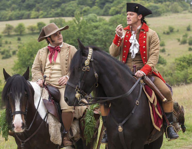 Josh Gad as LeFou, left, and Luke Evans as Gaston in <em>Beauty and the Beast</em>. (Photo: Disney)<br>