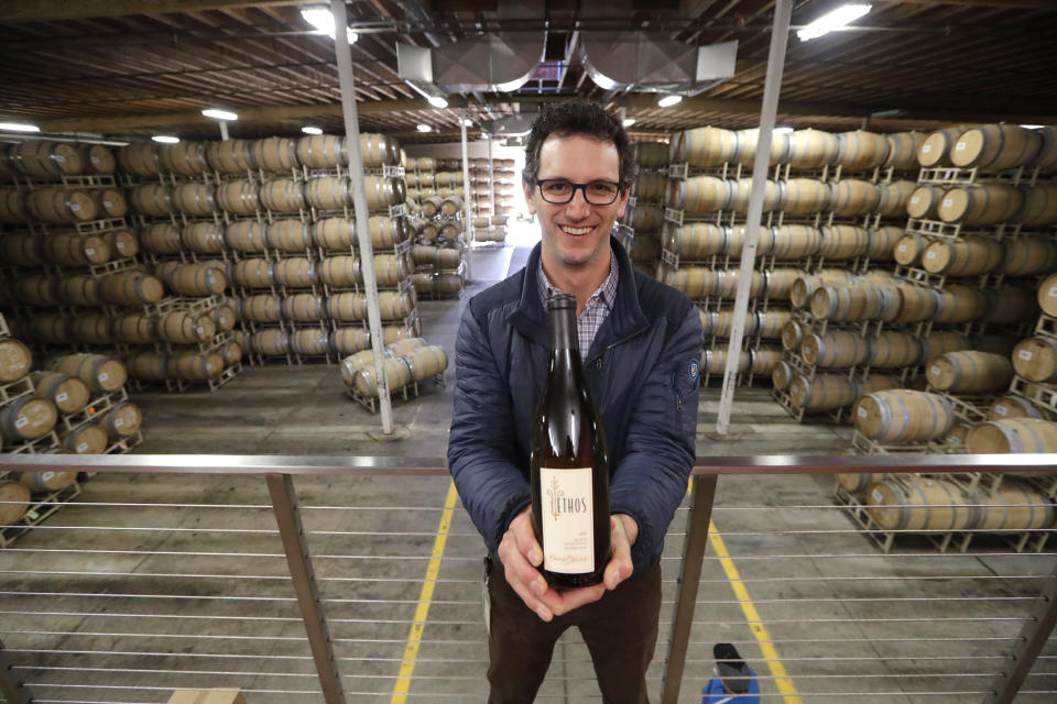 In this photo taken Thursday, Nov. 21, 2019, David Rosenthal, head white winemaker, poses for a photo at the Chateau Ste. Michelle winery in Woodinville, Wash. Washington, which now boasts more than 1,000 wineries in the state, has become a force in the wine industry. Washington is the second-largest producer of premium wines in the United States, trailing only California. (AP Photo/Elaine Thompson)