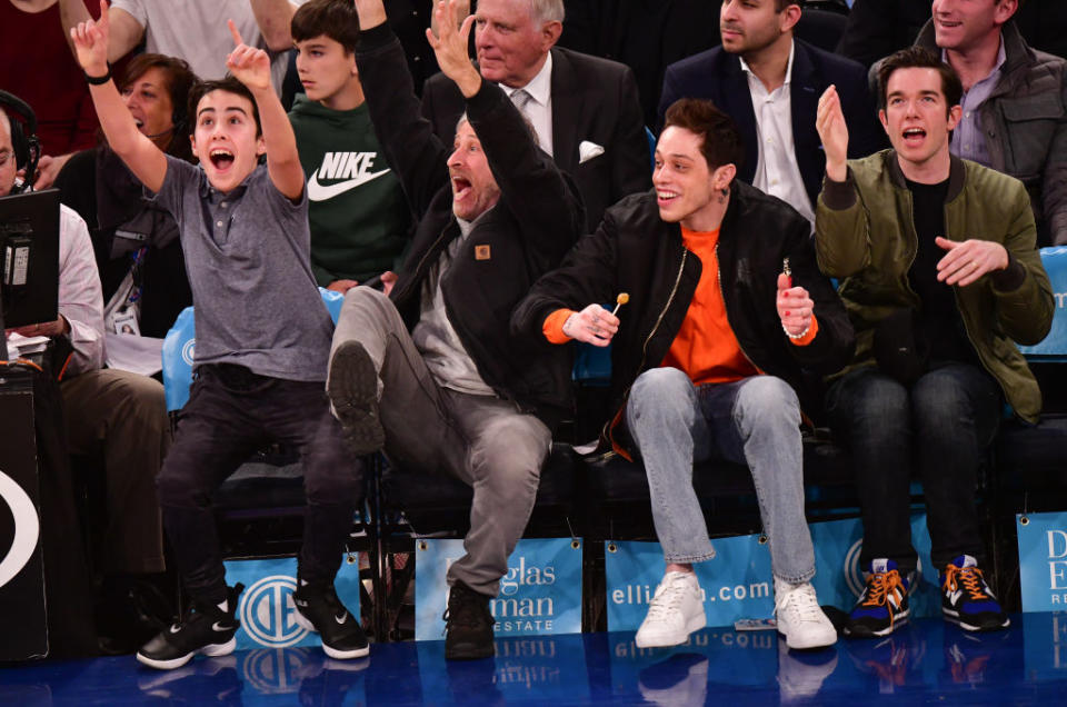 Nathan Stewart, Jon Stewart, Pete Davidson and John Mulaney attend Chicago Bulls v New York Knicks game at Madison Square Garden. Photo by James Devaney/Getty Images