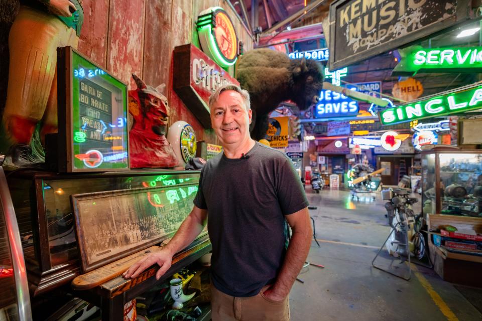 Rob Wolfe of "American Pickers" stands for a photo at his warehouse in Davenport, Wednesday, Dec. 13, 2023.