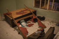 A hotel room is left damaged after an operation to detain migrants, many from Haiti, at this hotel at dawn in Ciudad Acuna, Mexico, Wednesday, Sept. 22, 2021, near the Texas, U.S. border. (AP Photo/Felix Marquez)