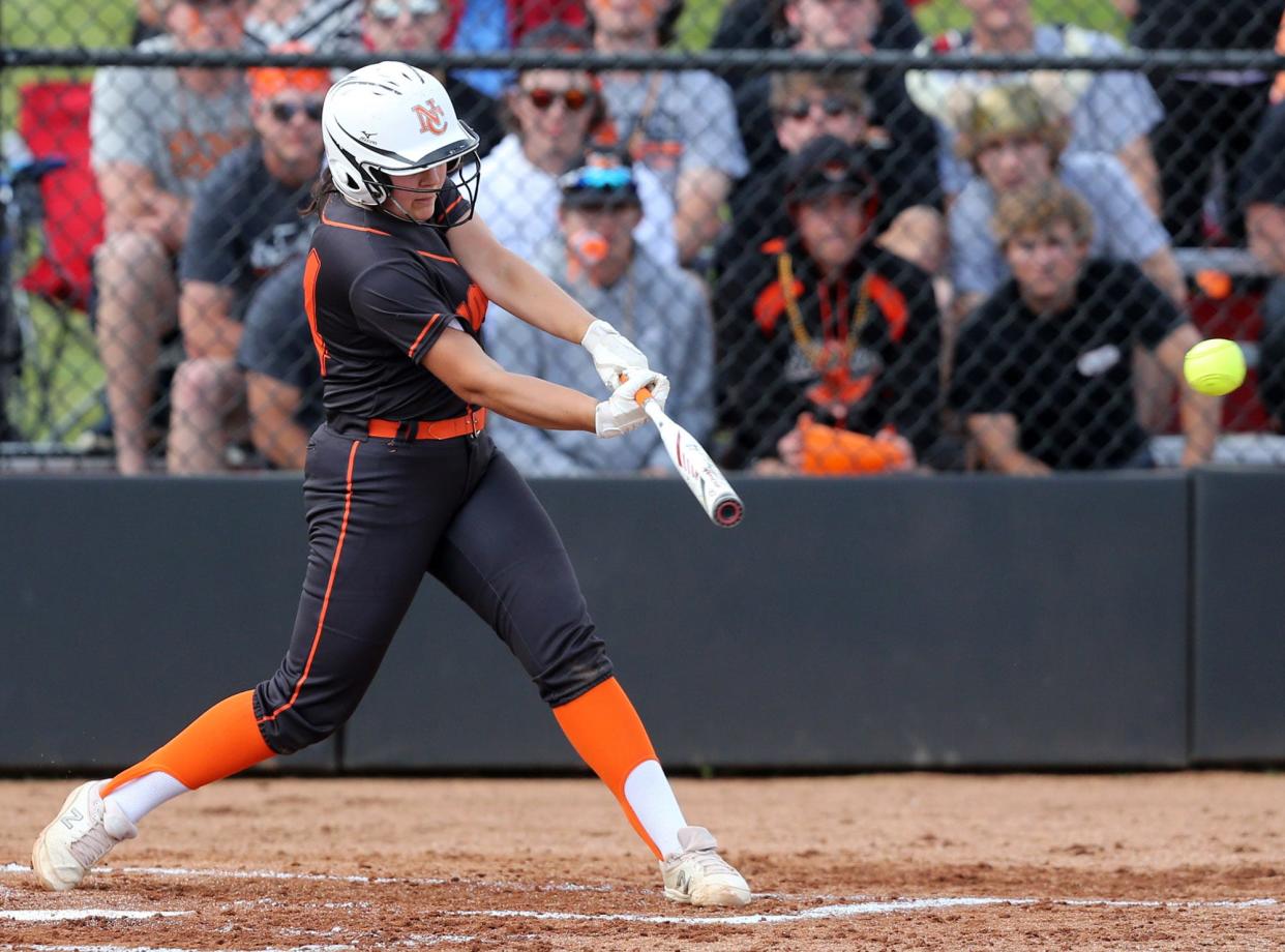 Sadie Carroll of Hoover drives in a run with a hit during a Division I regional final against Fitch at Youngstown State, Saturday, May 28, 2022.