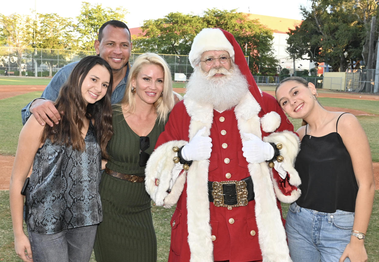 Ella Rodriguez, Alex Rodriguez, Jac Cordeiro and Natasha Rodriguez attend the Boys & Girls Clubs of Miami-Dade Toy Giveaway and Holiday Party on Dec. 14 2022 in Miami, Florida.  (Manny Hernandez / Getty Images)