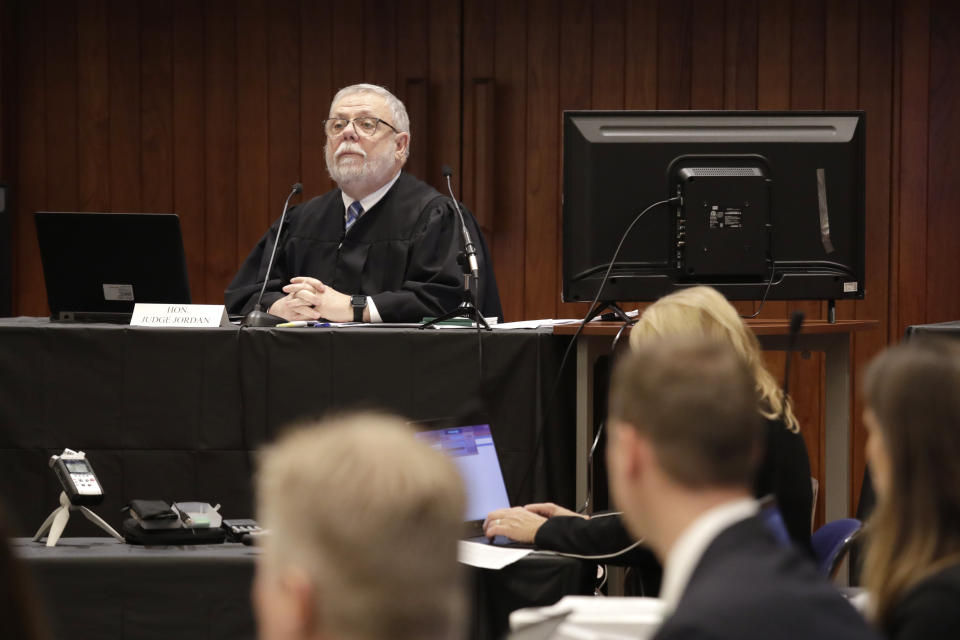 Federal Administrative Law Judge George Jordan speaks as he begins a hearing to help determine whether a small American Indian tribe can once again hunt whales, Thursday, Nov. 14, 2019, in Seattle. The Makah Tribe, from the northwest corner of Washington state, conducted its last legal hunt in 1999, when its crew harpooned a gray whale from a cedar canoe. (AP Photo/Elaine Thompson)