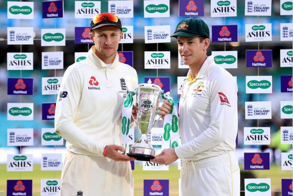 England captain Joe Root, left, is yet to commit to the Ashes tour but Australia counterpart Tim Paine is bullish it will go ahead (Mike Egerton/PA) (PA Archive)