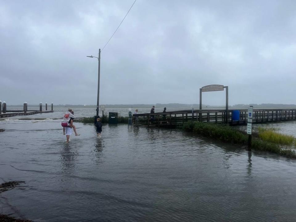 Storm surge and a high tide combined to flood Sands Beach in Port Royal Wednesday evening. Shortly before 8 p.m., rising waters were threatening to overtake the boardwalk near the beach. 