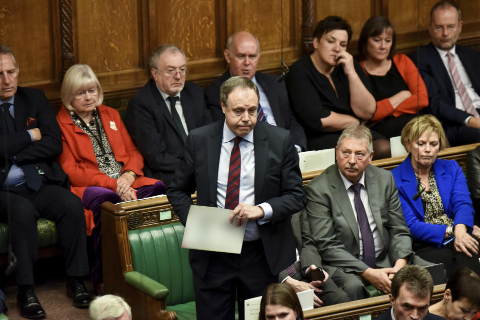 Northern Ireland's DUP (Democratic Unionist Party) deputy leader Nigel Dodds, centre, speaks during the Brexit debate inside the House of Commons in London Saturday Oct. 19, 2019. At the rare weekend sitting of Parliament, Prime Minister Boris Johnson implored legislators to ratify the Brexit deal he struck this week with the other 27 EU leaders. Lawmakers voted Saturday in favour of the 'Letwin Amendment', which seeks to avoid a no-deal Brexit on October 31. (Jessica Taylor/House of Commons via AP)