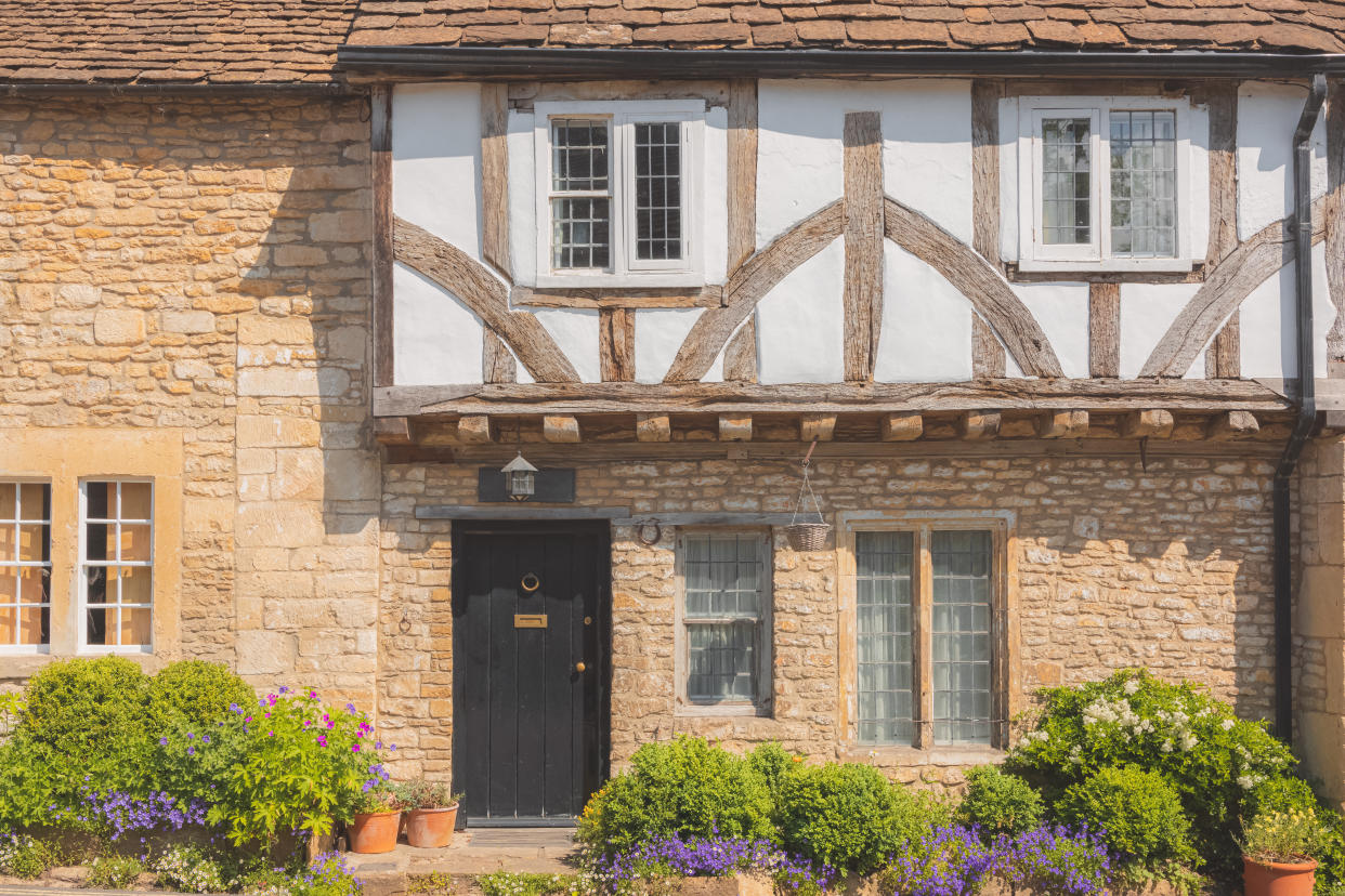 Buying a listed property. Timber frame country cottage in the historic, medieval Cotswolds English village of Castle Combe in Wiltshire, UK.