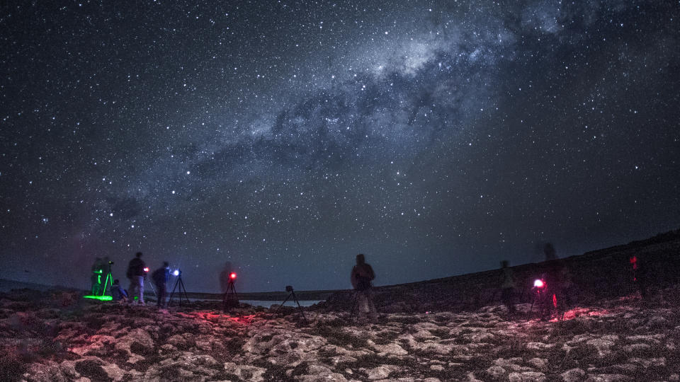 Group of photographer taking long exposures oh the night sky and the Milky Way. The Mine. Sleaford Bay. Eyre Peninsula, South Australia.