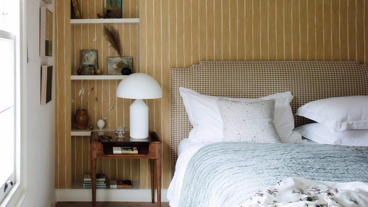  Bedroom with striped yellow wallpaper 