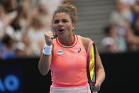 Jasmine Paolini of Italy reacts after winning a point against Anna Blinkova of Russia during their third round match at the Australian Open tennis championships at Melbourne Park, Melbourne, Australia, Saturday, Jan. 20, 2024. (AP Photo/Alessandra Tarantino)