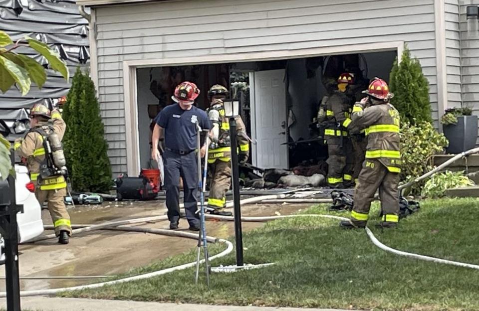 Electrical issues are suspected in this fire on Wellington Place in Dayton Thursday. Damage was estimated around $70,000. (Eric Higgenbotham/Staff)