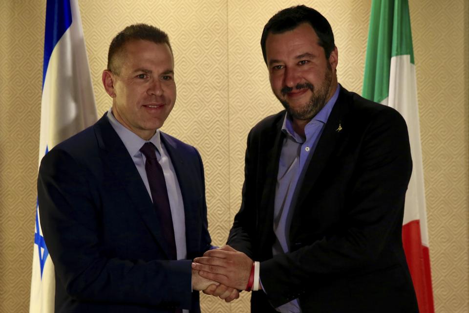 Israeli Public Security Minister Gilad Erdan, left, shake hands Italian Interior Minister Matteo Salvini after their meeting at the King David Hotel in Jerusalem, Tuesday, Dec. 11, 2018. (AP Photo/Ariel Schalit)