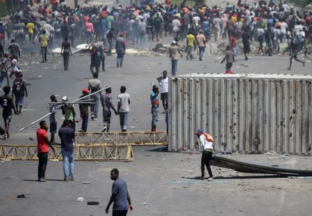 Protesters march during a demonstration demanding the resignation of Haitian President Jovenel Moise in Port-au-Prince
