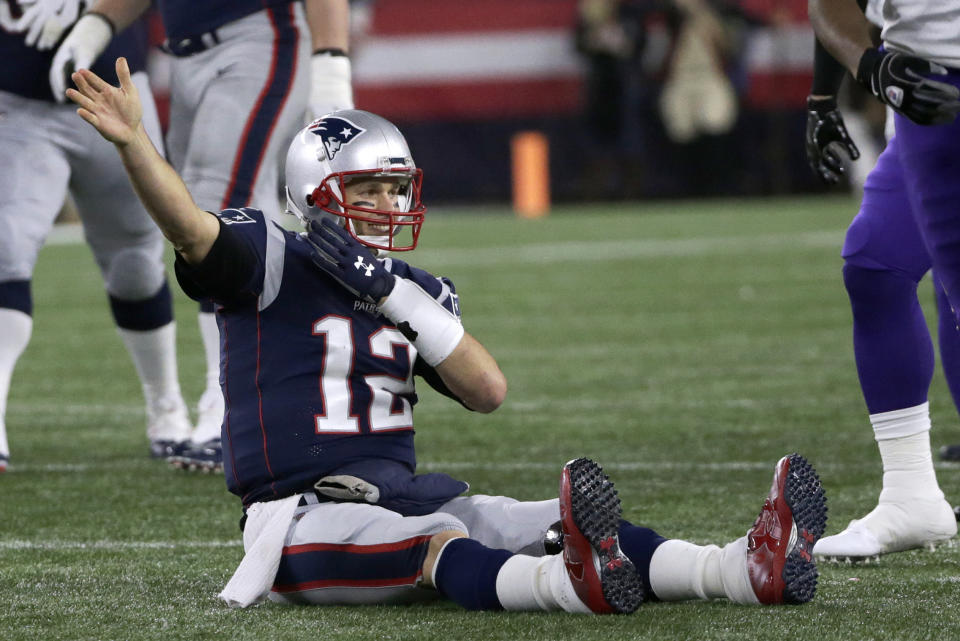 New England Patriots quarterback Tom Brady (12) signals first down after his run against the Minnesota Vikings during the first half of an NFL football game, Sunday, Dec. 2, 2018, in Foxborough, Mass. (AP Photo/Elise Amendola)