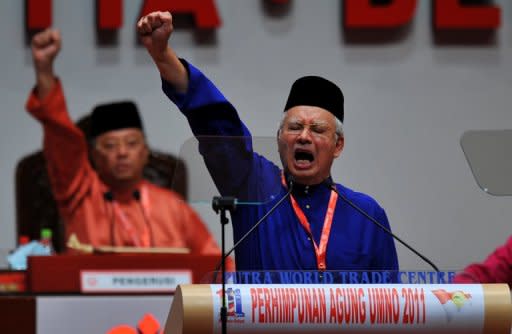 Malaysian Prime Minister Najib Razak (right) at the ruling party's annual general assembly in Kuala Lumpur in 2011. Activists have vowed to continue calls for electoral reform in Malaysia, with the protests coming at a precarious time for Razak's government as he is expected to call elections soon