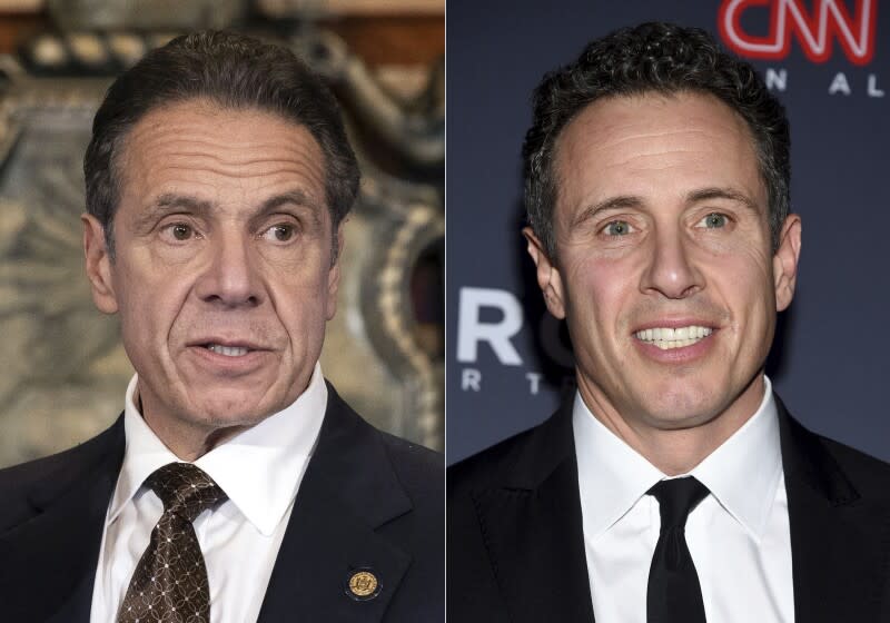 New York Gov. Andrew M. Cuomo, Cuomo appears during a news conference about the COVID-19 vaccine at the State Capitol in Albany, N.Y., on Dec. 3, 2020, left, and CNN anchor Chris Cuomo attends the 12th annual CNN Heroes: An All-Star Tribute at the American Museum of Natural History in New York on Dec. 9, 2018. CNN said it had reinstated a prohibition on Chris Cuomo interviewing or doing stories about his brother. The policy avoids a conflict of interest or at the very least the appearance of one. (Mike Groll/Office of Governor of Andrew M. Cuomo via AP, left, and Evan Agostini/Invision/AP)