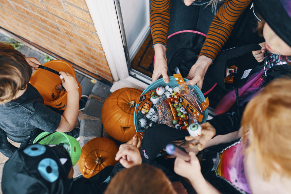 Stock picture of children getting sweets at Halloween. (Getty Images)