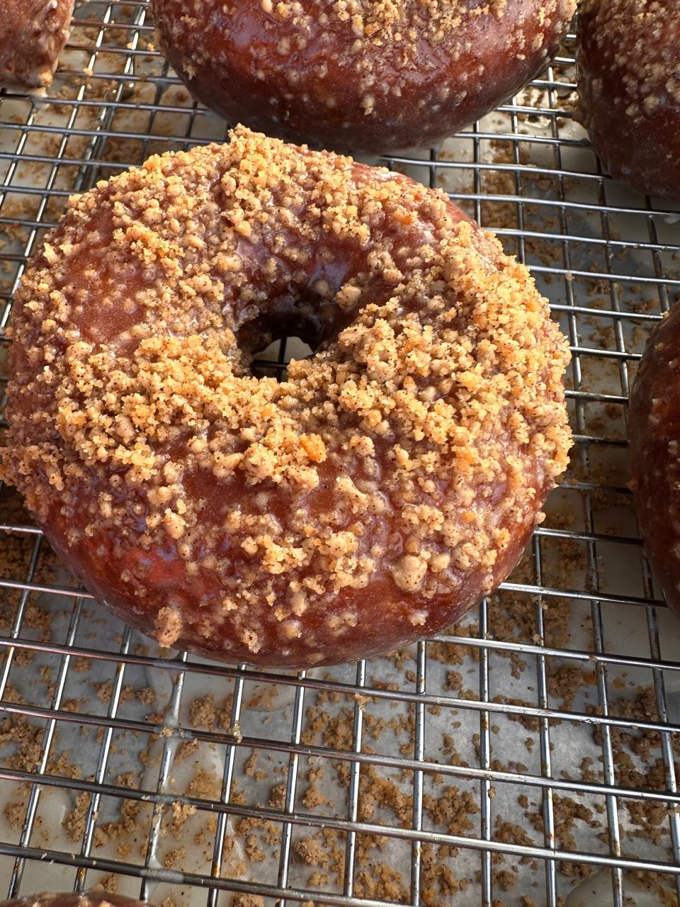 Pumpkin Yeasted Doughnuts with brown sugar coffee crumbs can be found at Curiosity Doughnuts in Doylestown.