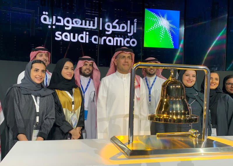 Participants attend the official ceremony marking the debut of Saudi Aramco's IPO on the Riyadh's stock market, in Riyadh