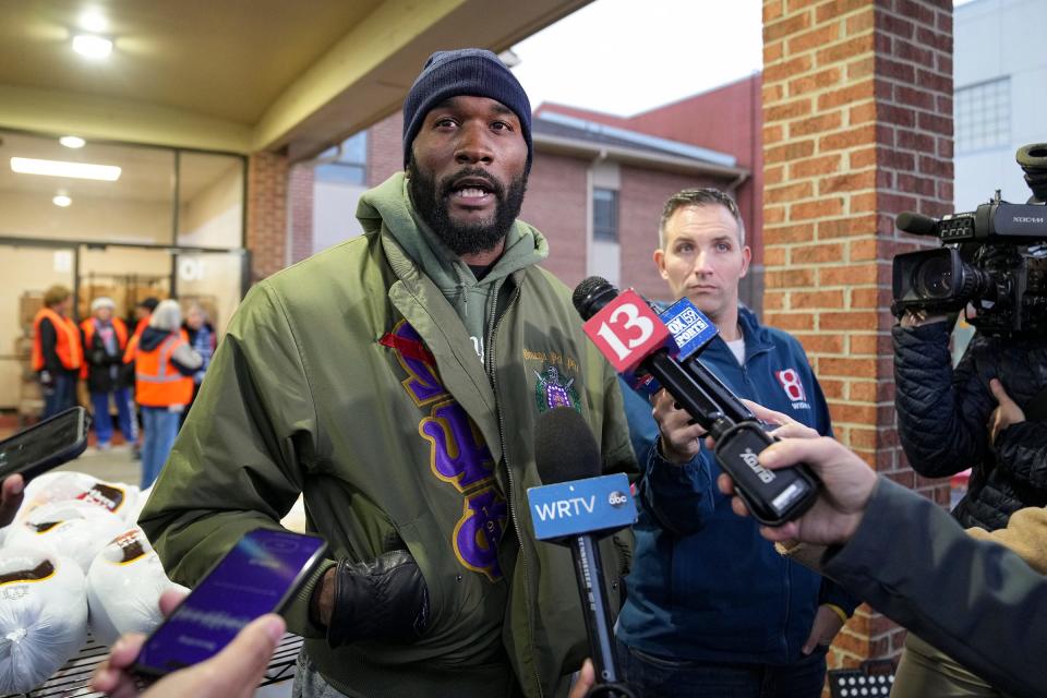 Former Indianapolis Colts linebacker Shaquille Leonard talks to media after he was released by the team Tuesday, Nov. 21, 2023, before helping with a food giveaway in Indianapolis. "It was the biggest surprise ever but I don't make those decisions," Leonard said. "It was shocking."