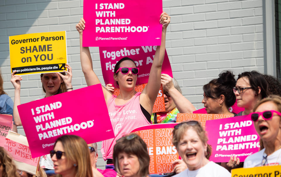 Pro-choice supporters and staff of Planned Parenthood hold a rally outside the Planned Parenthood Reproductive Health Services Center in St. Louis, Missouri, May 31, 2019, the last location in the state performing abortions. - A US Court on May 31, 2019 blocked Missouri from closing the clinic. (Photo by SAUL LOEB / AFP)        (Photo credit should read SAUL LOEB/AFP/Getty Images) (Photo: SAUL LOEB via Getty Images)