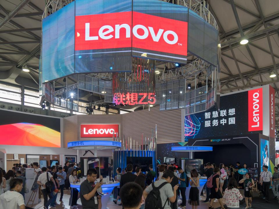 People visit the Lenovo stand during the Consumer Electronics Show (CES) Asia at Shanghai New International Expo Centre on June 13, 2018 in Shanghai, China.