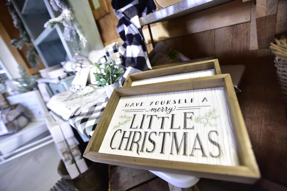 A decorative picture frame at Country Christmas Tree Farm located at 8122 Bricker Road in Greenwood Township on Monday, Nov. 14, 2022.