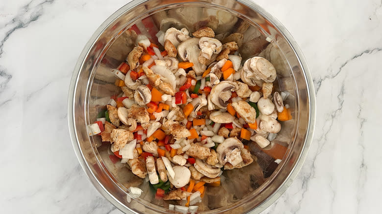 cooked chicken with raw vegetables