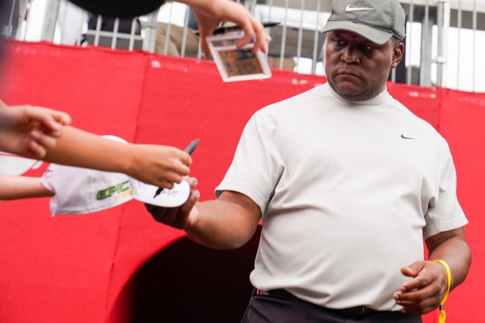 Barry Sanders signs autographs at the AREA 313 Celebrity Scramble at Detroit Golf Club in Detroit on Tuesday, June 27, 2023. 