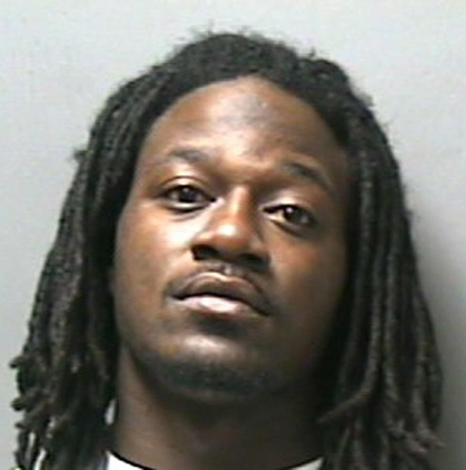 In this photo released by the Rutherford County Sheriff's Department Tennessee Titans football cornerback Adam "Pacman" Jones is shown Friday, Aug. 25, 2006, in Murfreesboro, Tenn. Jones was arrested outside a bar early Friday and charged with disorderly conduct and public intoxication. Officers saw Jones arguing loudly with a woman outside a nightclub according to the police report. The 22-year-old Jones was described by police as slurring his speech, having bloodshot eyes and smelling strongly of alcohol. The arrest came the day after the Titans broke training camp. (AP Photo/Rutherford County Sheriff's Dept.)