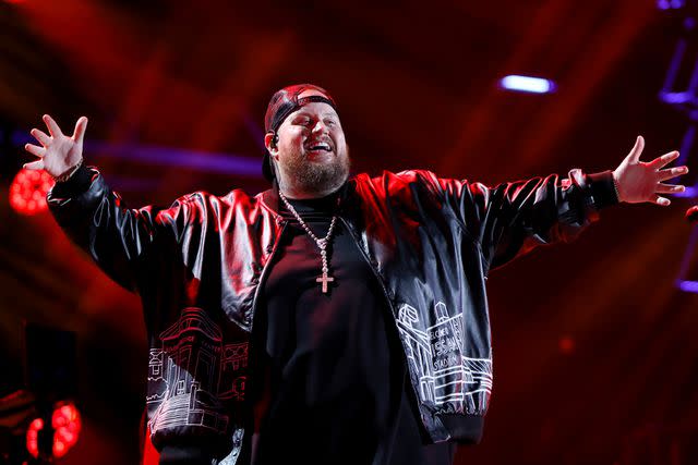 <p>Jason Kempin/Getty</p> Jelly Roll performs onstage during the 2024 CMA Music festival at the Nissan Stadium on June 8, 2024 in Nashville