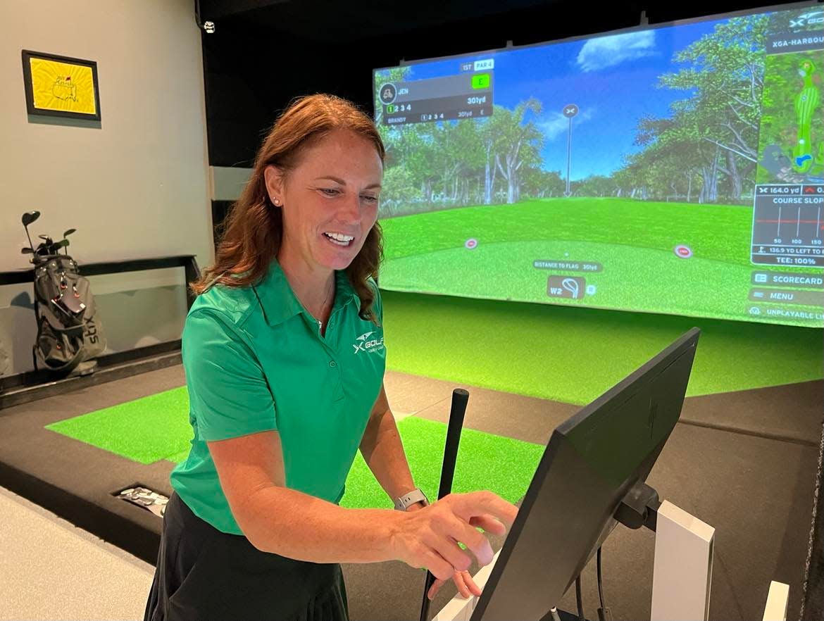 Jen Dillon, owner of X-Golf in Jackson Township, said she believes simulated golf is here to stay. Customers include both serious golfers and others who play for entertainment at X-Golf, which includes food and a full bar.