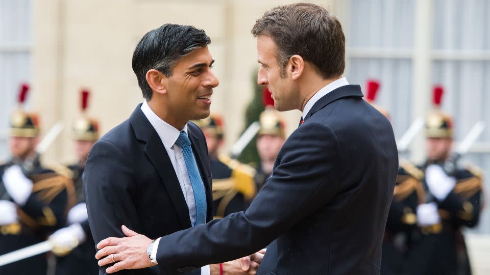 France's Emmanuel Macron greets UK Prime Minister Rishi Sunak ahead of their bilateral meeting at the Elysee Palace in Paris on March 10, 2023. - Nathan Laine/Bloomberg/Getty Images
