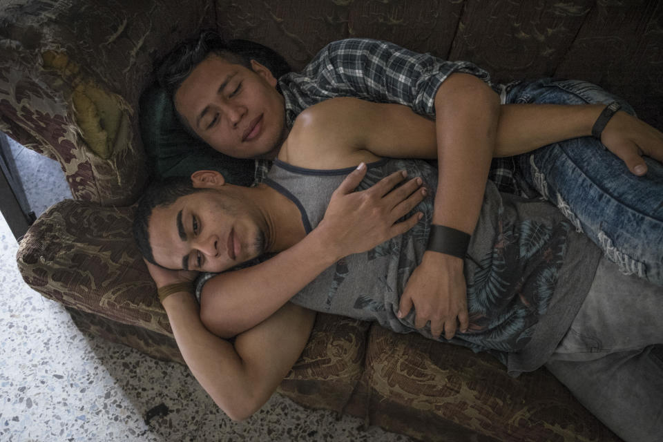 <p>A couple embracing on the sofa in the premises of the LGBT organization Arcoiris, in Tegucigalpa, capital of Honduras. In Honduras having a different kind of sexual orientation or gender identity exposes people to danger an discrimination. This condition of vulnerability is worsened by the conditions of general violence inflicting Honduras, a country where 92% of killings get unpunished.<br>In 2017, there have been 34 murders of LGBT community members in Honduras, according to the observatory on violent deaths of the organization Cattrachas.<br>In Honduras people have spaces to express themselves, such as the annual Gay Pride Parade or beauty contests events, and in a way united they are stronger, but the reality is also that LGBT rights defenders are targeted and killed and homosexuals and transgenders have high difficulties finding a job and walk safely in the streets.<br>Despite the abuses, many of the LGBT members try to lively their nature and by doing so they aim to show the people a reality which they can look away from. (Photo: Francesca Volpi) </p>