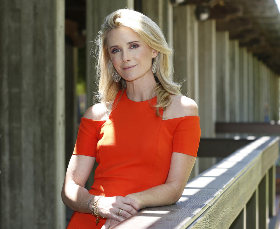 FILE-- In this July 1, 2019 file photo First Partner Jennifer Siebel Newsom, left, poses for a photo after attending a bill signing ceremony with her husband, Gov. Gavin Newsom at Sacramento City College in Sacramento, Calif. Siebel Newsom has shunned the traditional title of "first lady" and is focusing on women's issues including equal pay and expanding family leave. (AP Photo/Rich Pedroncelli, File)