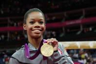 <b>Women's gymnastics' individual all-around</b><br>The three-peat is completed by Gabrielle Douglas at the 2012 Olympics. She became the third straight U.S. woman to win the most coveted title in gymnastics. (Photo by Ronald Martinez/Getty Images)