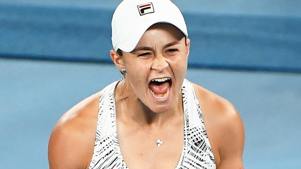 Ash Barty is seen celebrating after winning the 2021 Australian Open.