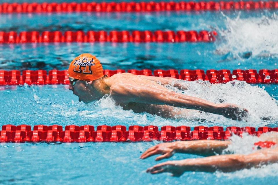 Harrison junior Matthew Klinge competes in the 100-yard butterfly at the IHSAA boys swimming and diving state championships at IU Natatorium on Saturday, Feb. 25, 2023.