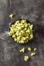 <p>A little bit of green tea matcha turns a regular bowl of popcorn into a ghoulishly good treat. </p><p>Get the <a href="https://www.goodhousekeeping.com/food-recipes/a28542905/green-matcha-popcorn-recipe/" rel="nofollow noopener" target="_blank" data-ylk="slk:Green Matcha Popcorn recipe;elm:context_link;itc:0;sec:content-canvas" class="link "><strong>Green Matcha Popcorn recipe</strong></a>. </p>