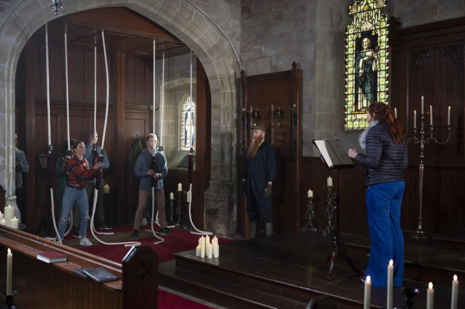 Contestants ring bells in an old church