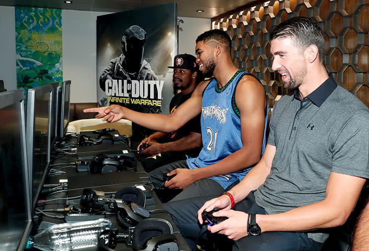 Phelps played alongside retired (for now?) NFL player Marshawn Lynch (far left) and NBA player Karl-Anthony Towns. (Photo: Rich Polk/Getty Images for Activision)