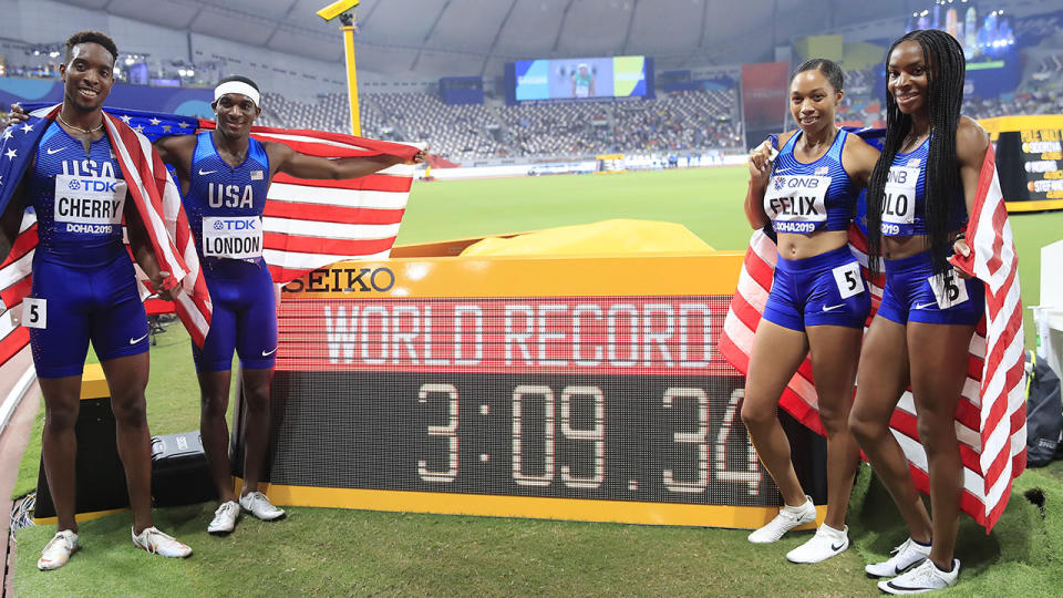 Wilbert London, Michael Cherry, Courtney Okolo and Allyson Felix, pictured here with their new world record.